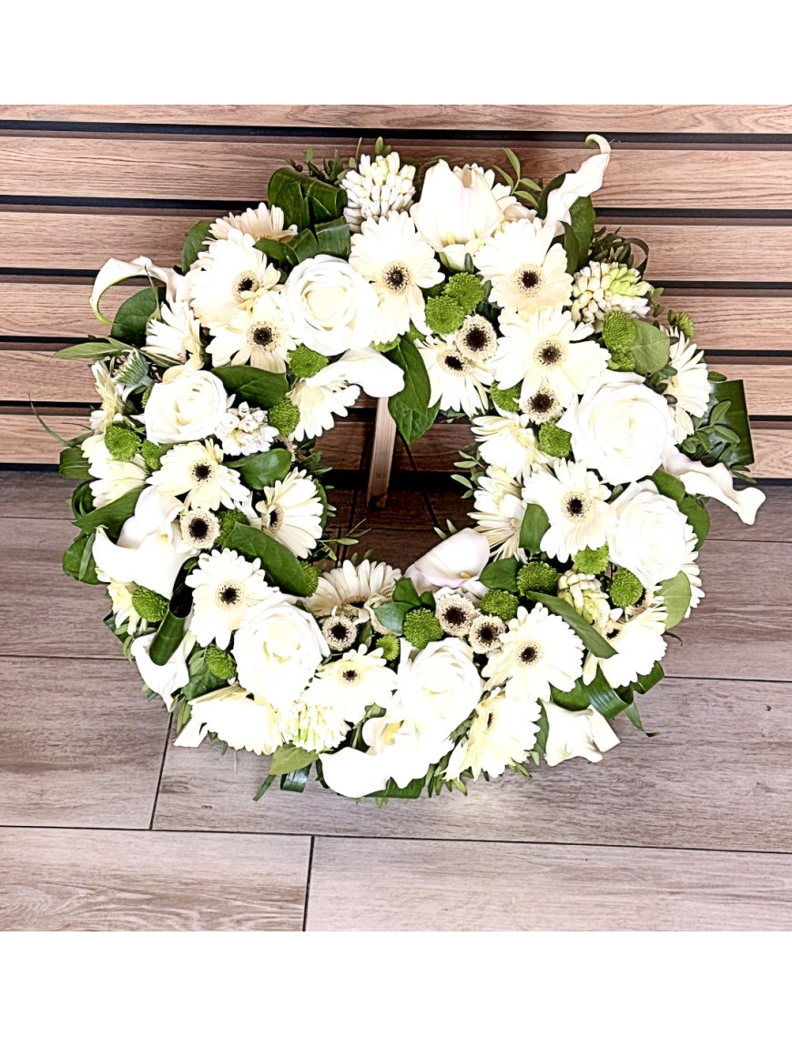 Coroana funerara cu cale, trandafiri, gerbera, santini si tuberose Coroana funerara cu cale, trandafiri, gerbera, santini si tuberose